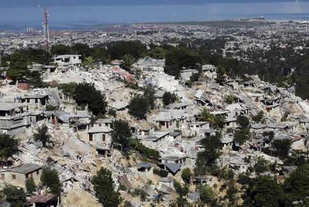 Barrios completos barridos por el terremoto, como un castillo de naipes, Foto de Reuters, en EL País. Com